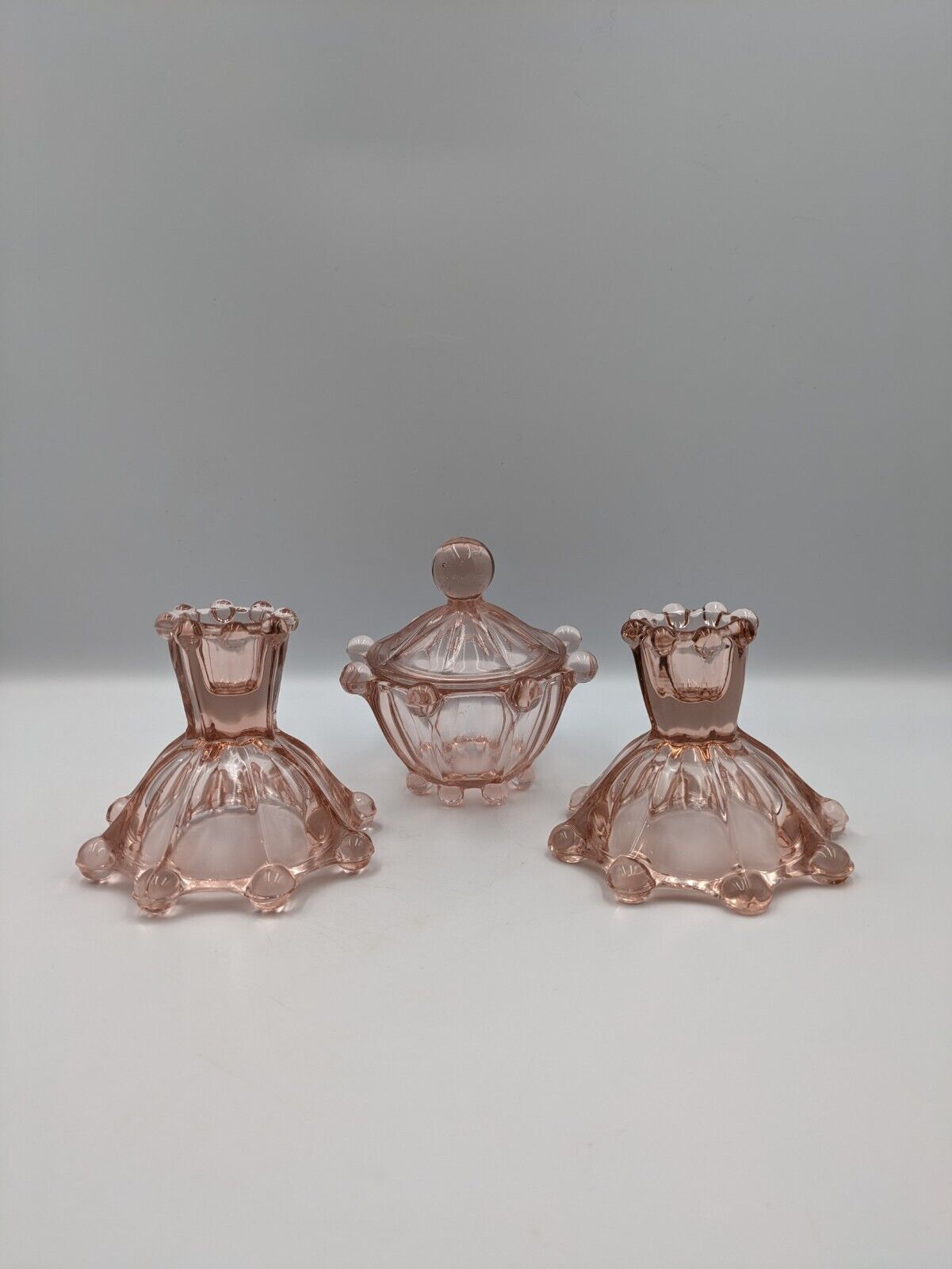 ART DECO VINTAGE GLASS DEPRESSION PINK GLASS CANDLESTICKS & LIDDED POT VANITY