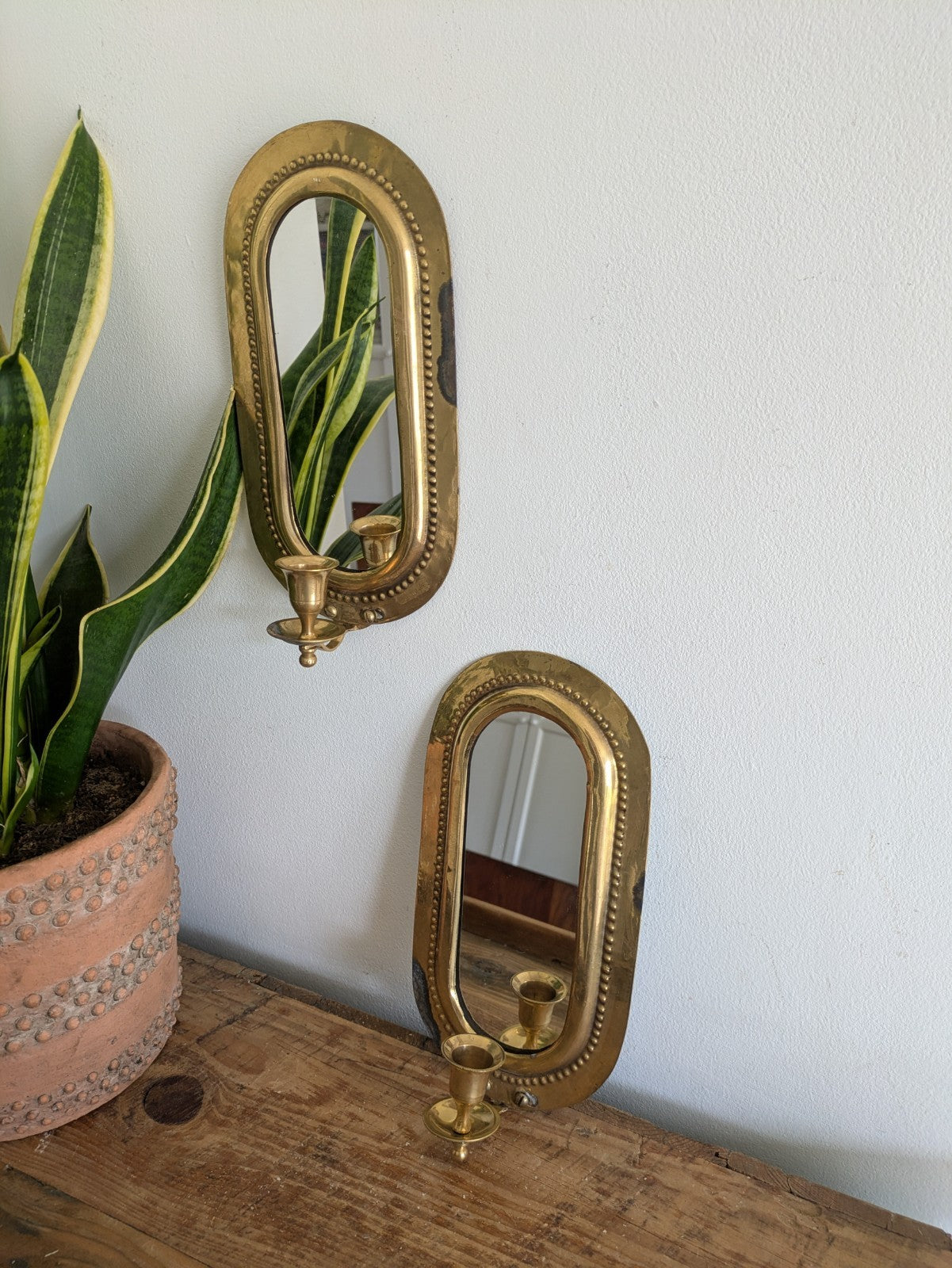 Pair Vintage MidC Scandinavian Repoussé Brass Candle Mirrored Wall Sconce Holder