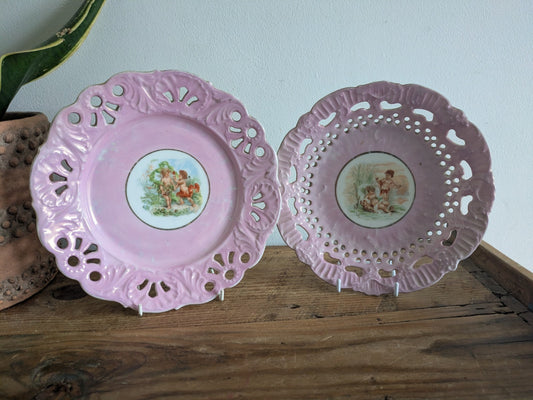 Pair Of ANTIQUE Victorian Pink Porcelain Pierced Ribbon Plates Cherubs Putti Vgc