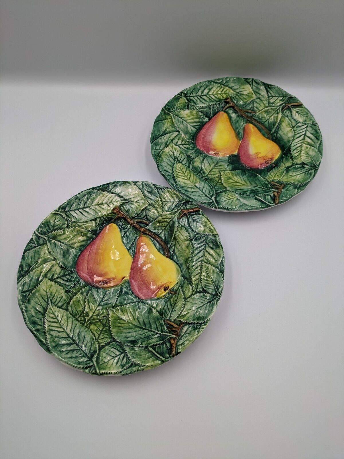 2x Neiman Marcus Majolica Fruit Plates Made in Italy Decorated Leaf Pear Side
