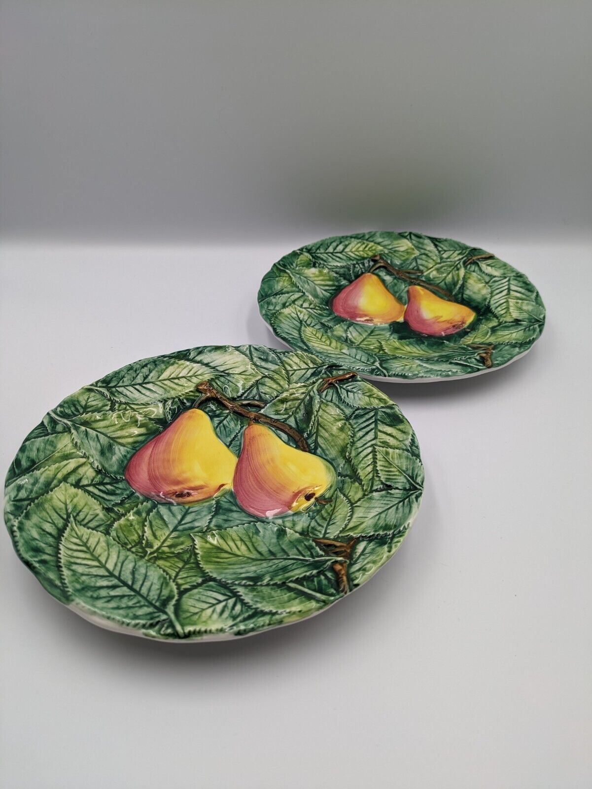 2x Neiman Marcus Majolica Fruit Plates Made in Italy Decorated Leaf Pear Side