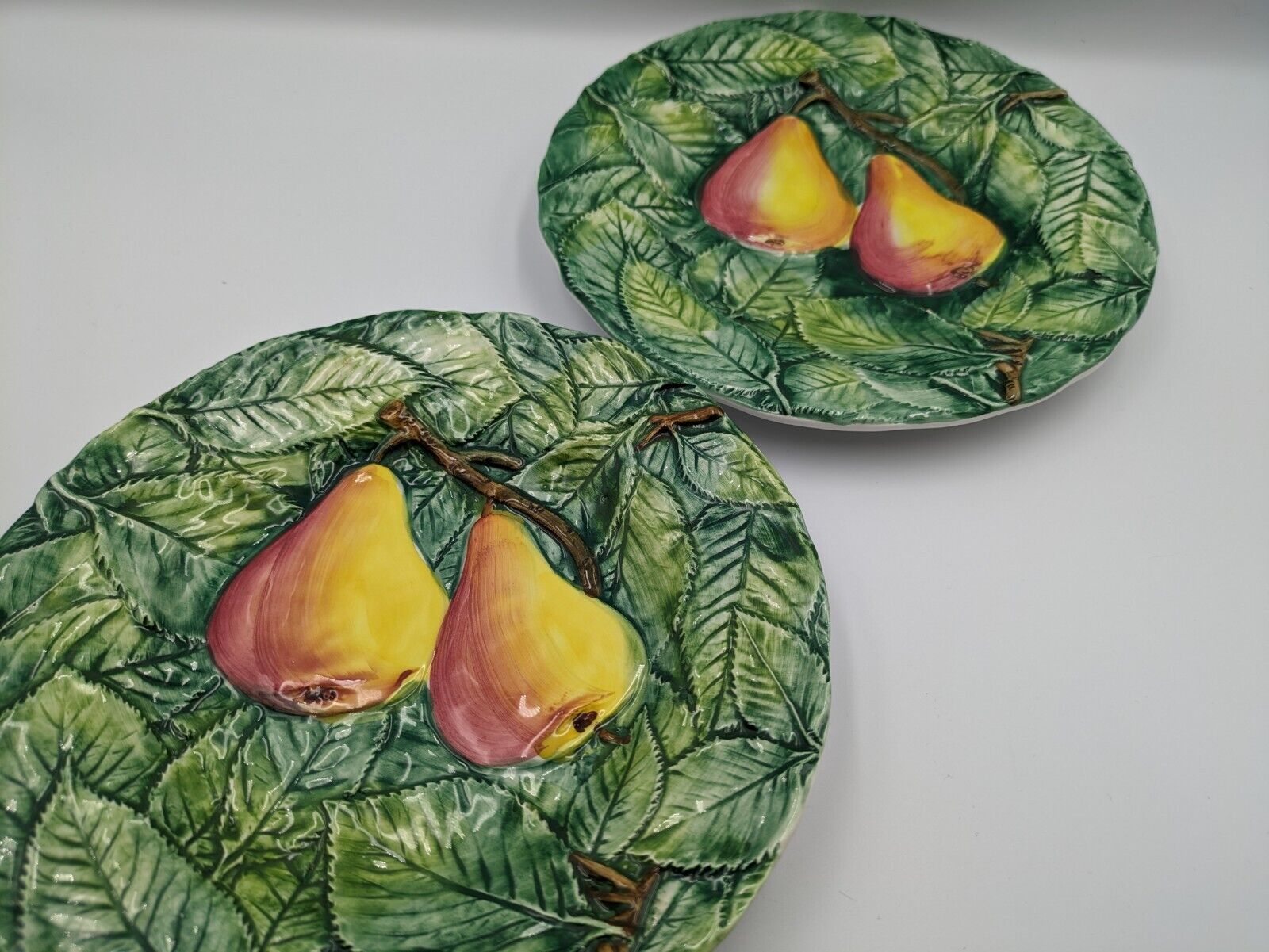 2x Neiman Marcus Majolica Fruit Plates Made in Italy Decorated Leaf Pear Side