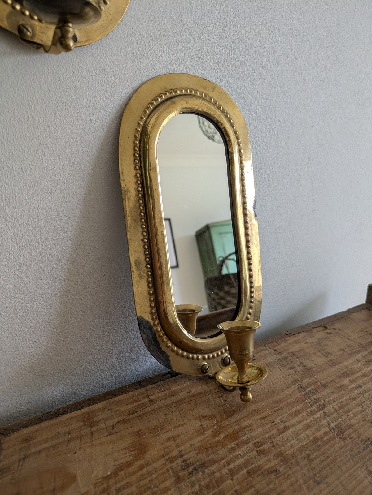Pair Vintage MidC Scandinavian Repoussé Brass Candle Mirrored Wall Sconce Holder