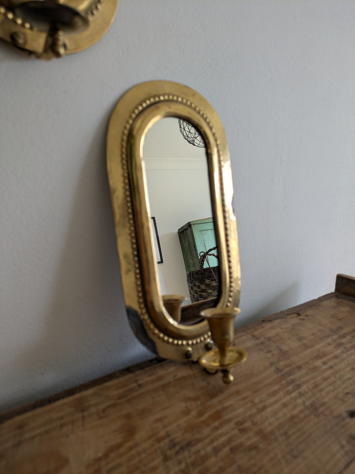 Pair Vintage MidC Scandinavian Repoussé Brass Candle Mirrored Wall Sconce Holder