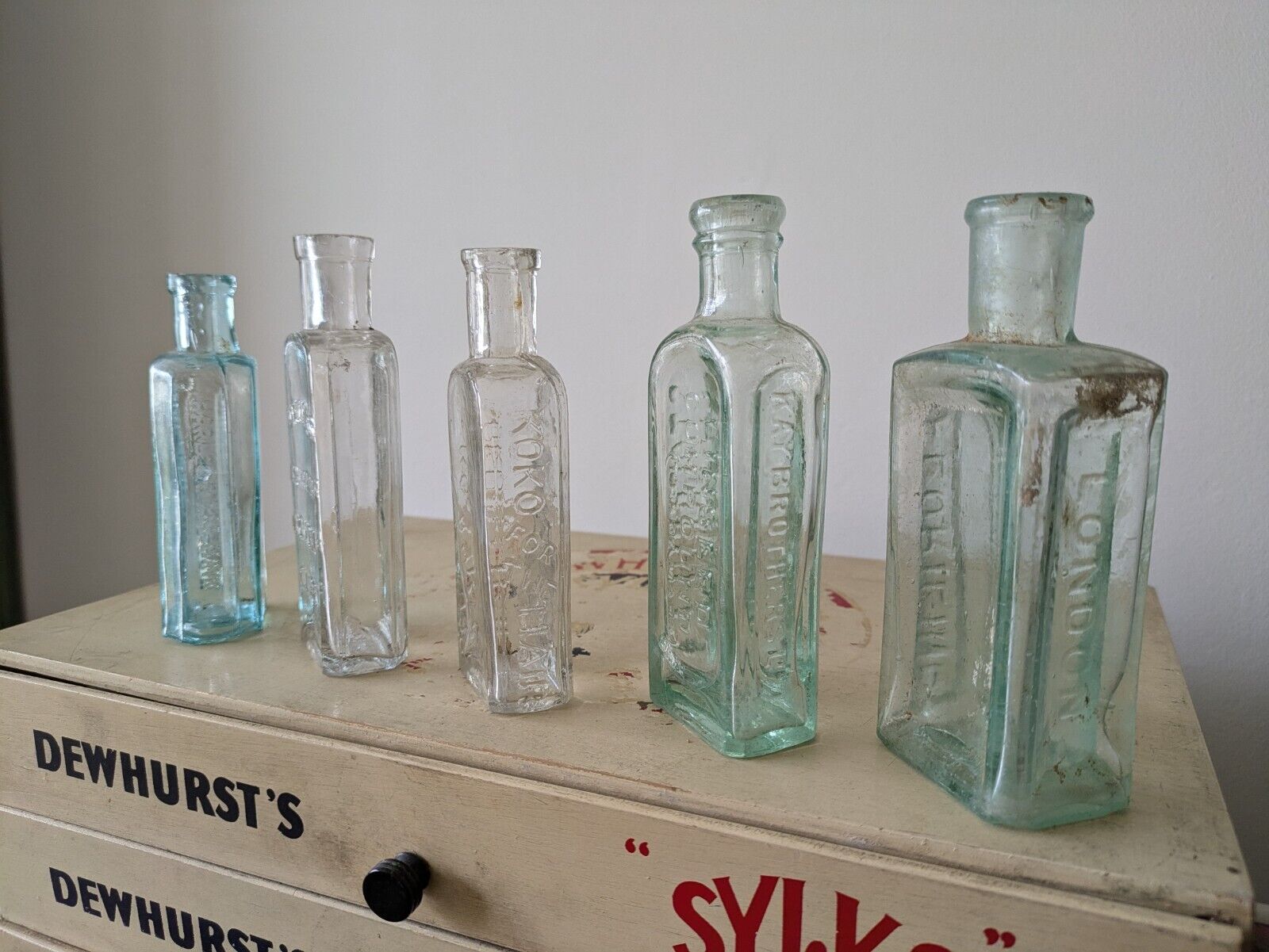 5x Antique Vintage Glass Bottles vase apothecary Cough Cure Koko Veno Hair Vgc