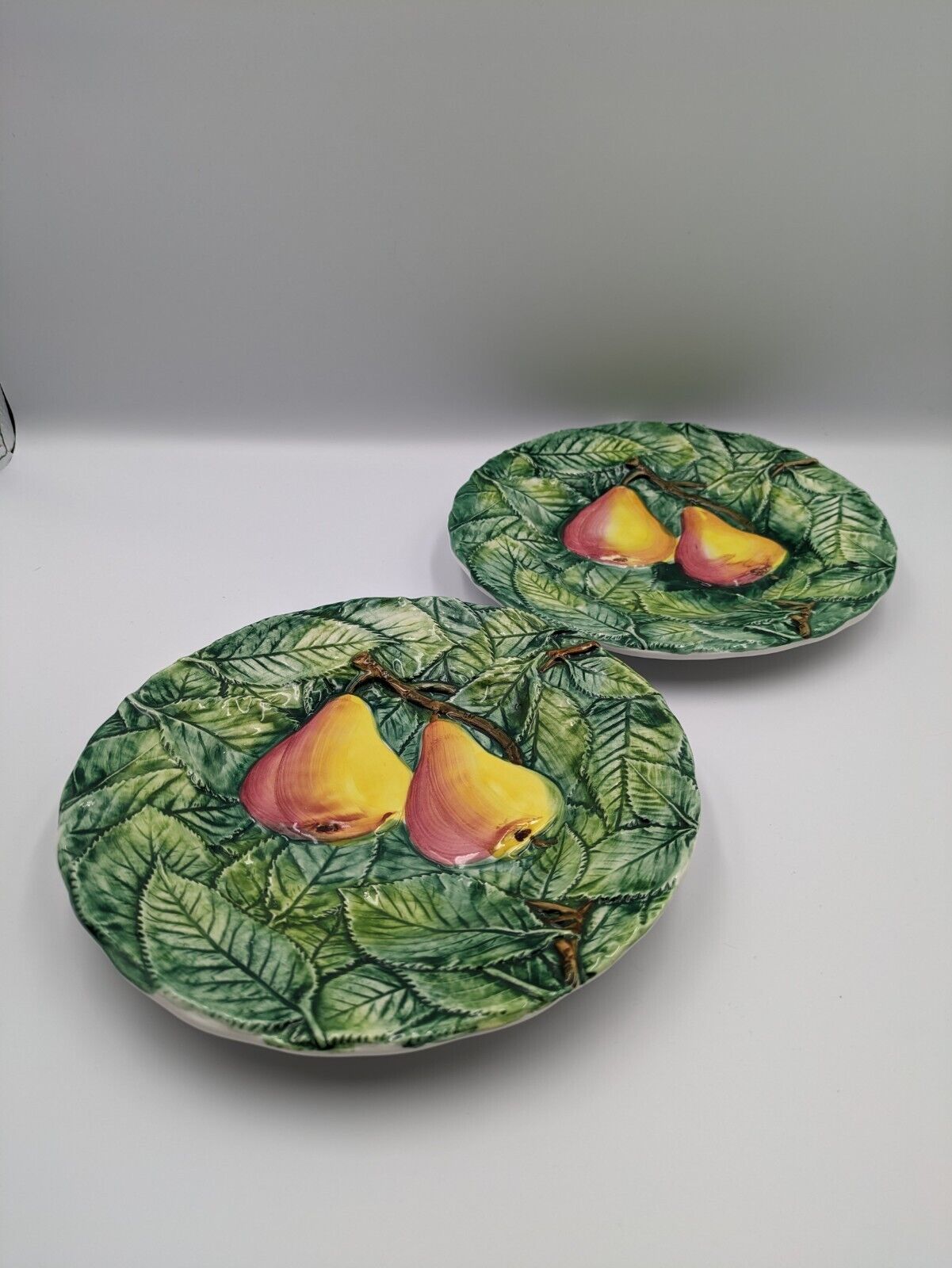 2x Neiman Marcus Majolica Fruit Plates Made in Italy Decorated Leaf Pear Side