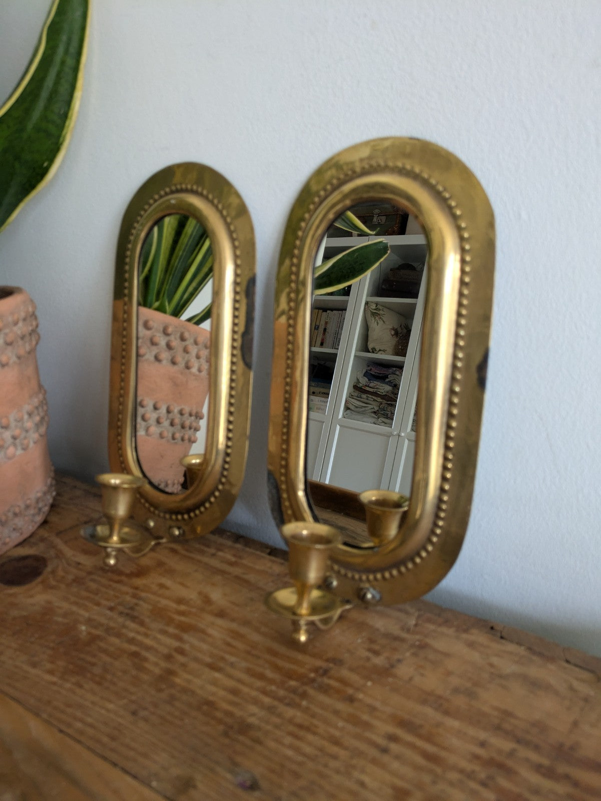 Pair Vintage MidC Scandinavian Repoussé Brass Candle Mirrored Wall Sconce Holder