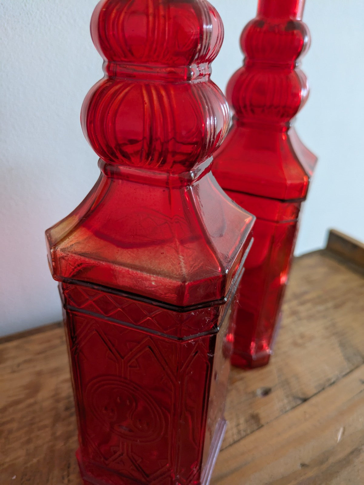 2x Ruby Red Embossed Glass Bottles 30cm Tall Pair Bar Mancave Boho Hippy VTG Old