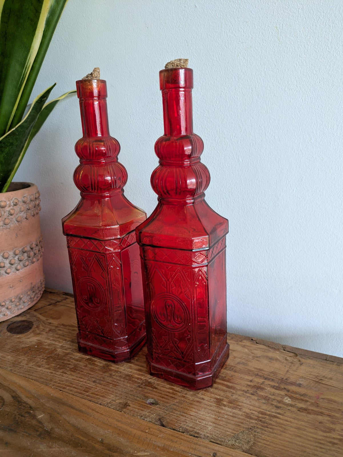 2x Ruby Red Embossed Glass Bottles 30cm Tall Pair Bar Mancave Boho Hippy VTG Old