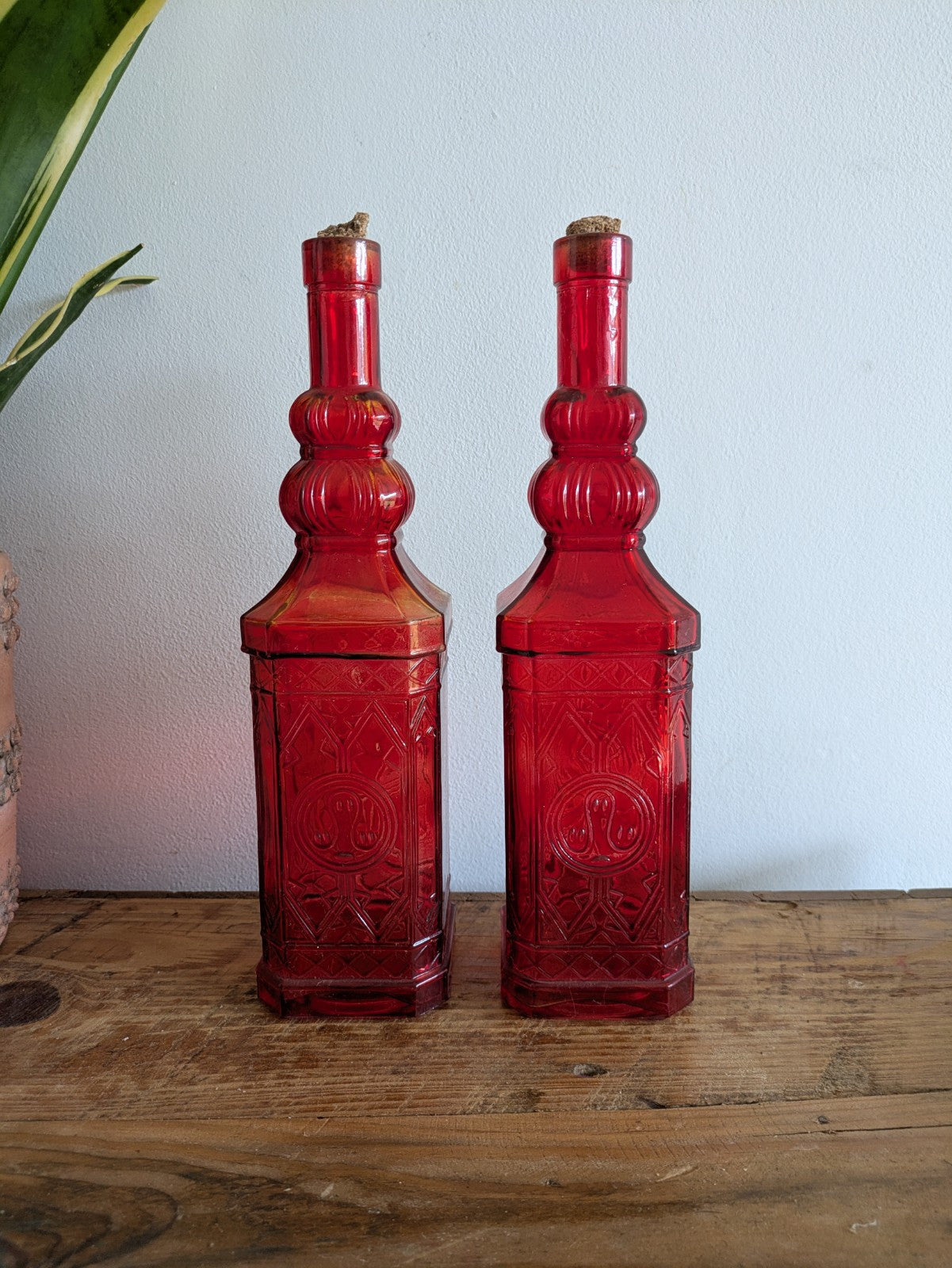 2x Ruby Red Embossed Glass Bottles 30cm Tall Pair Bar Mancave Boho Hippy VTG Old