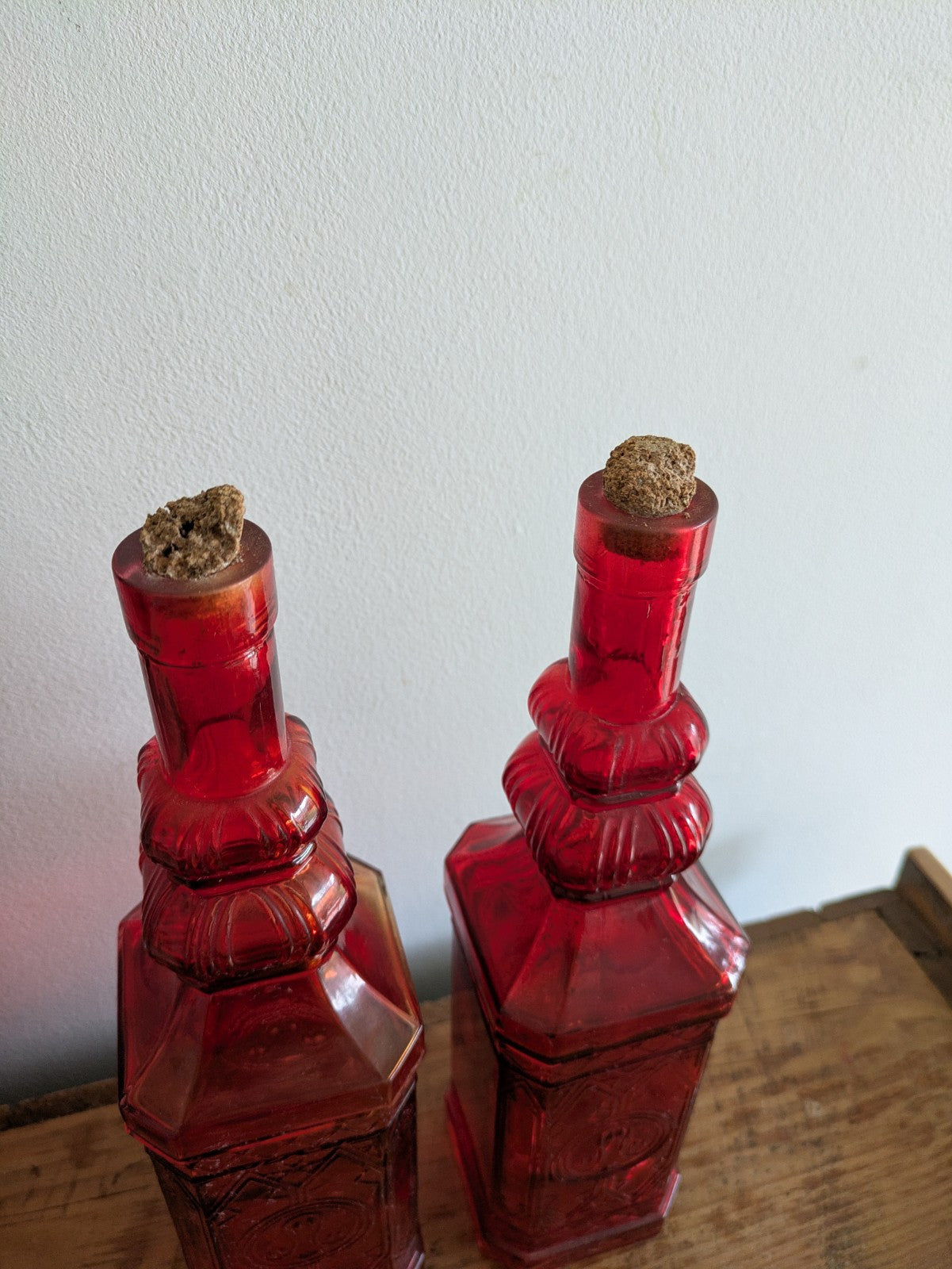 2x Ruby Red Embossed Glass Bottles 30cm Tall Pair Bar Mancave Boho Hippy VTG Old
